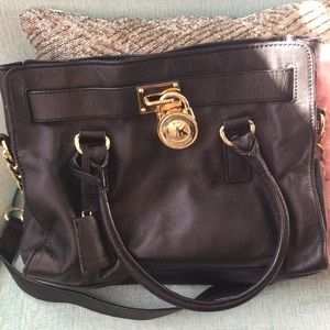Michael kors Blk bag with large lock on front
